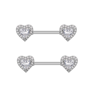 Detail of silver heart-shaped nipple rings with sparkling white cubic zirconia stones