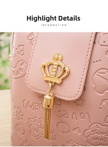 Detailed macro view of pink PU leather with heart embossing and golden crown pendant