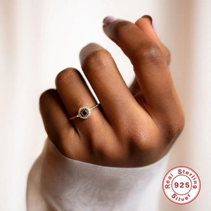Luxury S925 sterling silver ring with black diamond center and halo pavé setting