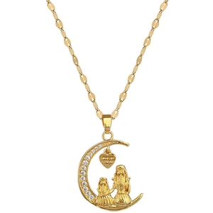 Titanium gold crescent moon necklace with mother and child pendant and crystal heart