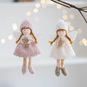 Two felt Christmas angel girl ornaments in pink and white with plush dresses and sequins
