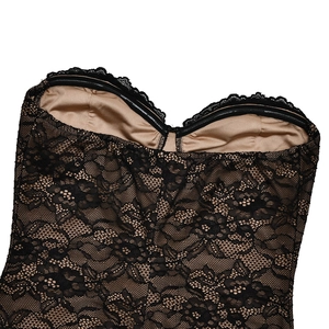 Detail of lace texture and non-slip silicone strip on black mesh strapless dress