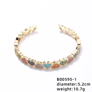 Detail showing 5.2cm diameter and 10.7g weight of gold heart bracelet with colorful gems