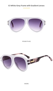 Detail view of white aviator sunglasses with gradient grey lenses and tortoise temples