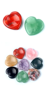 Close-up of heart-shaped natural crystal worry stones in diverse vibrant colors and textures