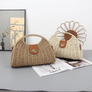 Handmade woven straw crossbody bags in khaki and beige with gold metal twist locks