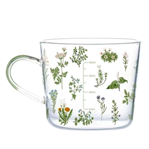 Floral print 400ml clear glass mug with handle and measurement markings for milk and water