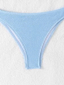 Light blue seersucker bikini bottoms with textured fabric and classic low-rise cut
