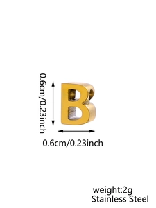 Macro shot of 0.6cm golden stainless steel letter B bead showing precise measurements
