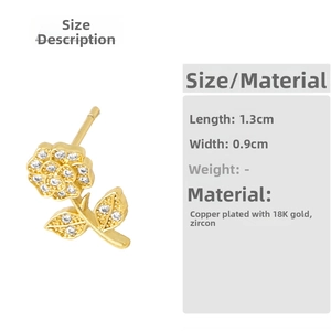 Detail view of 18K gold plated flower earrings with white zircon, size 1.3cm by 0.9cm