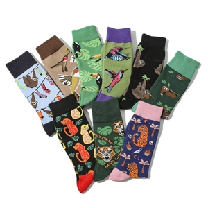 Vibrant cartoon animal print crew socks featuring sloth, hummingbird, and leopard patterns