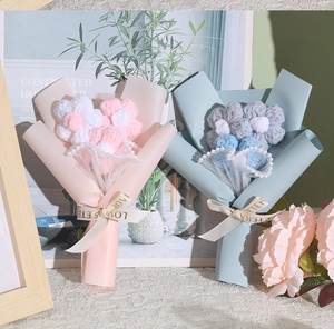 Detail of crochet mini bouquets with lace trim, pearl chains and LOVE printed ribbons