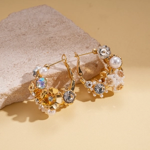 Elegant floral hoop earrings with faux pearls and sparkling rhinestones in gold plating