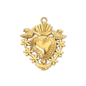 Detailed view of a golden heart pendant with dove and floral embossed relief patterns