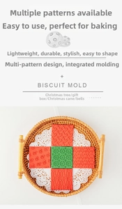 Set of Christmas cookie cutters with deer and tree patterns on white lace paper