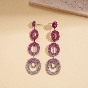 Elegant silver tassel earrings with round rings and pink-to-white gradient crystals