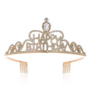 Macro shot of a golden metal Happy Birthday crown set with sparkling rhinestones