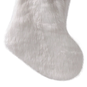 Close-up of soft white plush Christmas stocking with detailed faux fur texture