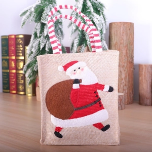 Sac cadeau de Noël en lin avec applique Père Noël 3D et poignées rayées rouges