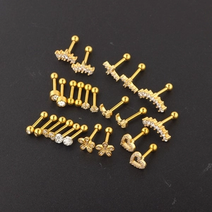 Golden stainless steel cartilage earrings set featuring moon heart and crown shapes with zircon
