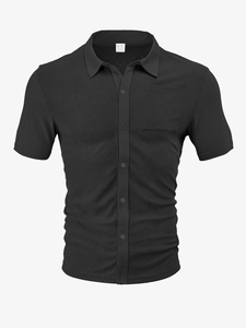 Detail of black polo shirt featuring diamond knit texture and chest pocket on 3D mannequin