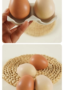 Detailed macro view of realistic PU foam stress eggs and ceramic holder on straw mat