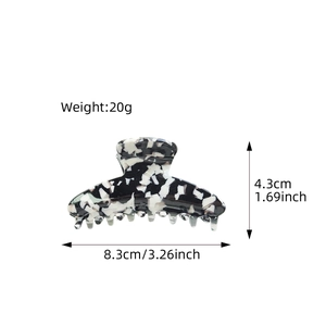 Black and white marble acetate hair claw clip with 8.3cm width and 20g weight