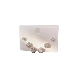 Set of three pairs of silver-tone round stud earrings with sparkling cubic zirconia stones