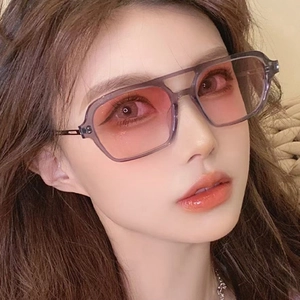 Stylish square oversized sunglasses with pink-orange gradient lenses and grey frames