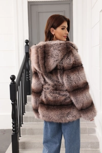 Detail view of brown gradient faux fur coat for women with a warm hooded design