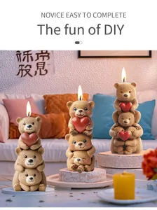 Stacked bear aroma candles in different heights with red hearts and textured finish
