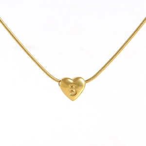 Detailed view of an 18K gold stainless steel heart pendant necklace with letter B engraving
