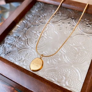 Gold plated stainless steel oval pendant necklace with You are adorable engraving