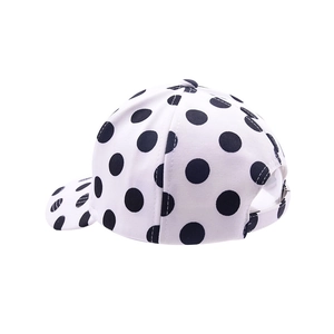 Classic white baseball cap with black polka dot pattern and stylish curved brim design