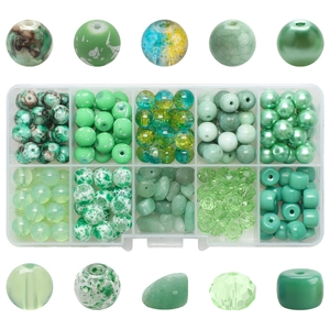 Detailed set of green DIY beads in 10-grid clear box with various shapes and textures