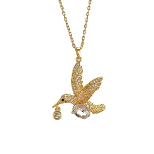 Gold plated hummingbird pendant necklace with micro paved cubic zirconia crystals