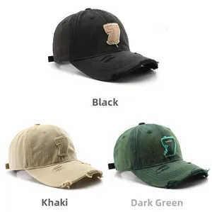 Detailed view of distressed baseball caps with frayed holes and Chance 7 patch embroidery