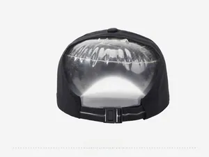 Rear view of black breathable baseball cap featuring transparent PVC window and adjustable strap