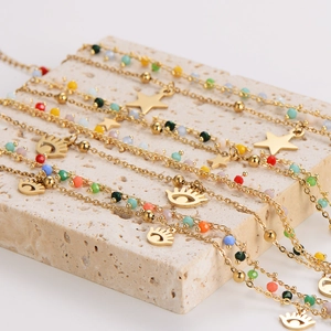 Gold double-layer stainless steel bracelet with star charms and evil eye colorful beads
