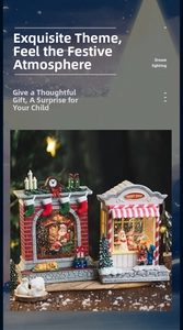 Detailed view of lighted Christmas fireplace and candy shop resin ornaments with warm glow