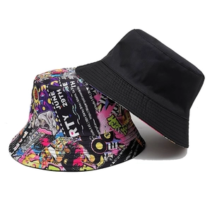 Graffiti bucket hat with double-sided design featuring nostalgic 90s cassette pattern