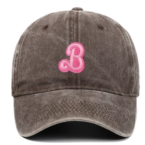 Detailed shot of pink letter B towel embroidery on vintage washed cotton baseball cap