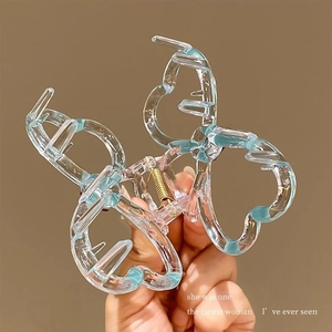 Sparkling bow hair claw clip in transparent acrylic with blue edges for women