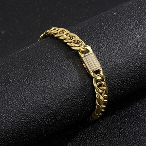 Detailed view of gold Cuban link chain with luxury CNC micro diamond paved clasp