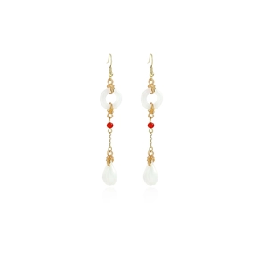 Detail of Chinese style tassel earrings with jade-like ring and red bead in gold finish