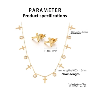 Macro shot of gold stainless steel necklace and cross earrings set with dimensions