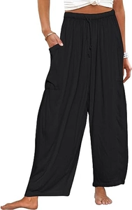 Détail d'un pantalon sarouel noir pour femme avec poches latérales et cordon de serrage