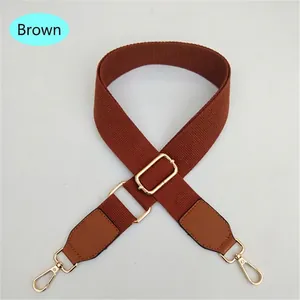 Verstellbarer brauner Canvas-Taschenriemen mit goldenen Karabinerhaken und Lederverstärkung
