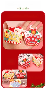 Detail of Christmas pop-it game with soft silicone buttons and portable keychain hook