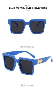 Detail view of square blue sunglasses with golden M metal decoration on temples